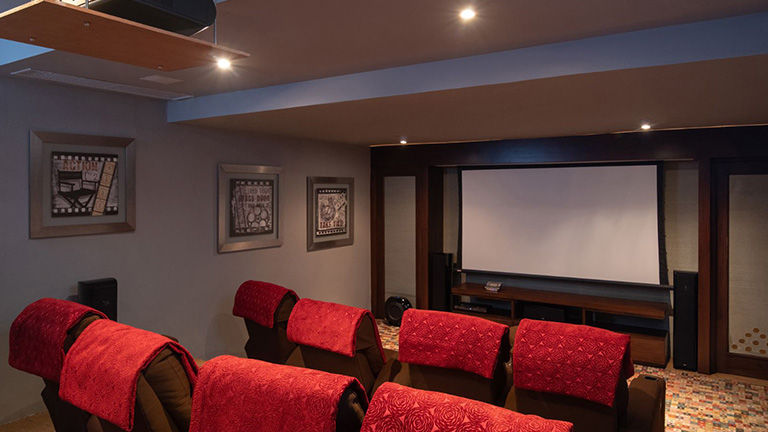 Villas can include amenities such as home movie theaters.