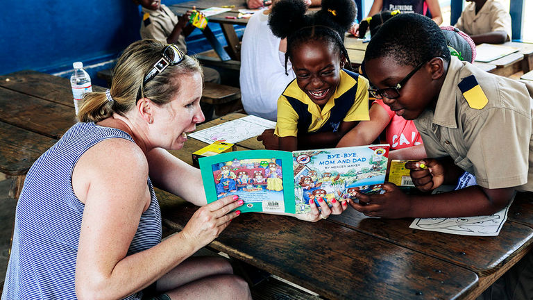 The Sandals Foundation’s Reading Road Trip program is a weekly voluntourism excursion that connects visitors to locally supported schools and its students.