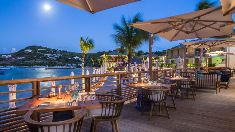 The ultra-luxurious Le Barthelemy Hotel & Spa features a lively rooftop bar and Michelin-starred cuisine.