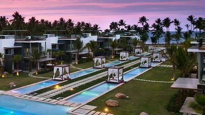 The central pool area features walkways and cabanas. // © 2016 Sublime Samana