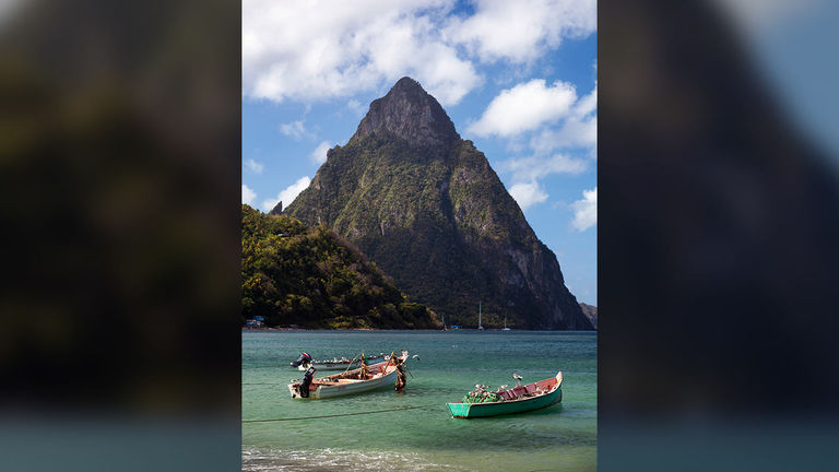 The Pitons are two volcanic spires located on St. Lucia.