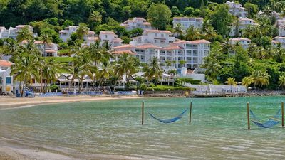 Part of the resort’s renovation includes new in-water hammocks. // © 2015 Windjammer Landing Villa Beach Resort