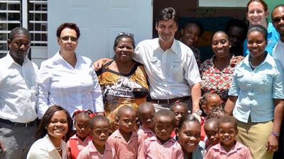 Representatives of the Sandals Foundation, Sandals Whitehouse European Village & Spa and the Culloden Early Childhood Institute proudly stand outside the newly opened infant classroom at Culloden. The early childhood school was built by the Sandals Foundation and was constructed as an environmentally-friendly institution. // © 2014 Sandals Resorts International