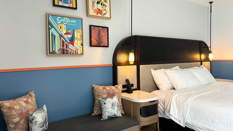 Guestrooms feature San Juan-inspired poster art.