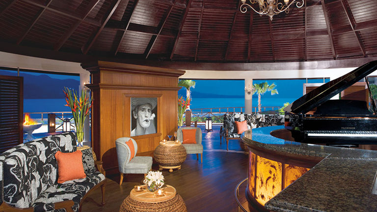 Head to the Cuban-themed Piano Bar for live music after dinner. Credit 2018 AMResorts