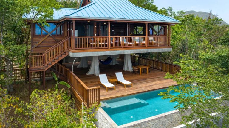 Secret Bay features eco-luxe villas with plunge pools, rainforest views, and access to group-friendly adventures. Secret Bay features eco-luxe villas with plunge pools, rainforest views, and access to group-friendly adventures.