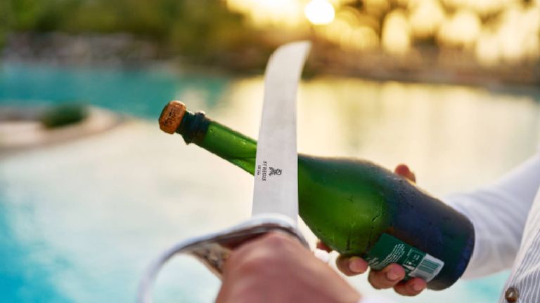 The St. Regis Cap Cana Resort offers signature St. Regis rituals including afternoon tea and a Champagne sabrage ceremony at sunset.