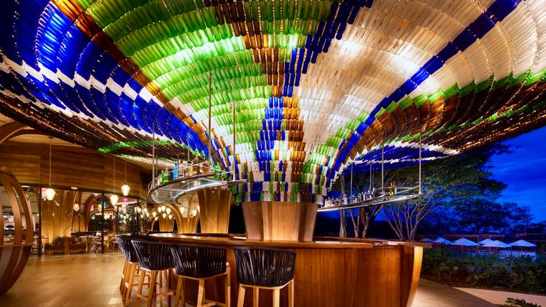 The Living Room chandelier was inspired by a hummingbird tail.