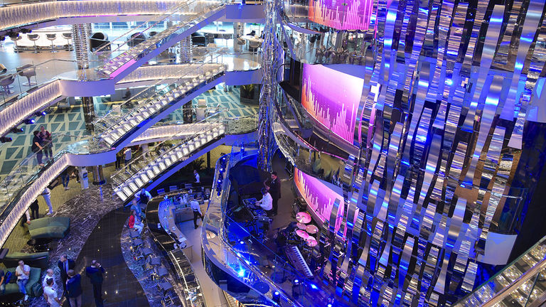 A four-deck atrium features a huge LED screen, three live musicians’ balconies and staircases studded in dazzling Swarovski crystals.