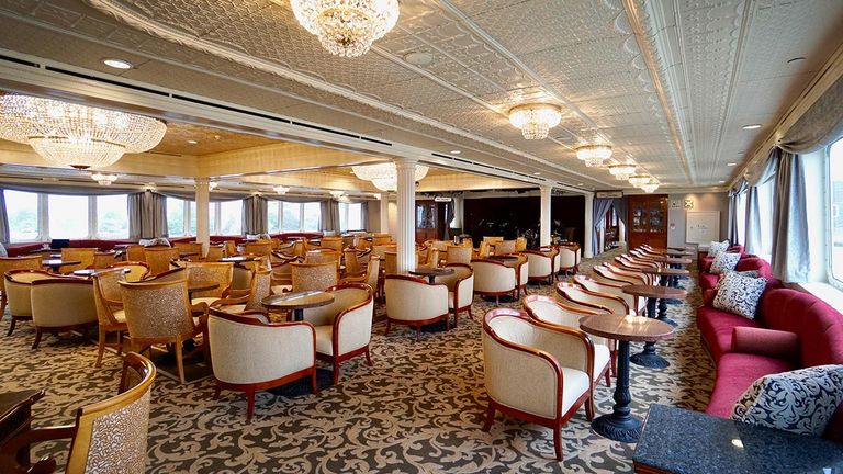 Compass Lounge offers casual elegance with chandeliers and live music.