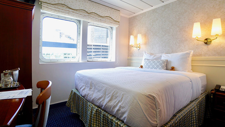 Cabins onboard Victory I are cozy, with expansive window vistas and storage.