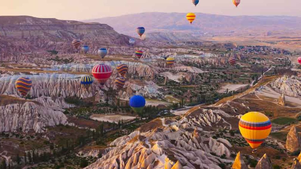 Visitors can see the sun rise over Cappadocia in a hot-air balloon. // © 2014 Thinkstock/ Tatiana Popova 2