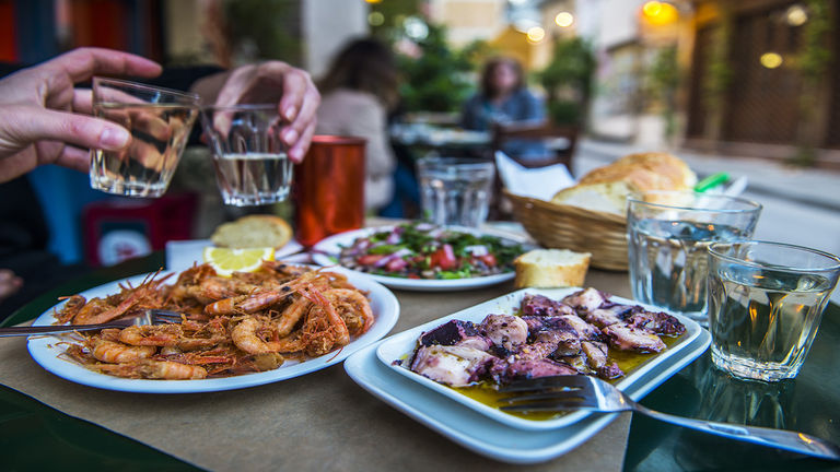 Clients on a food tour will sample classic Athenian dishes.