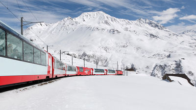 The train takes passengers between St. Moritz and Zermatt through the Swiss Alps. // © 2014 Glacier Express