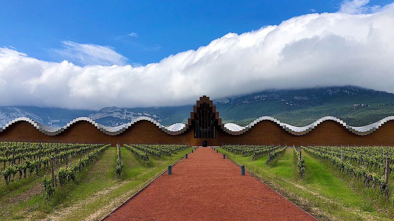In harmony with its surrounding, Bodegas Ysios is one of several excellent wineries located in La Rioja, an easy day trip from Basque Country’s main cities.
