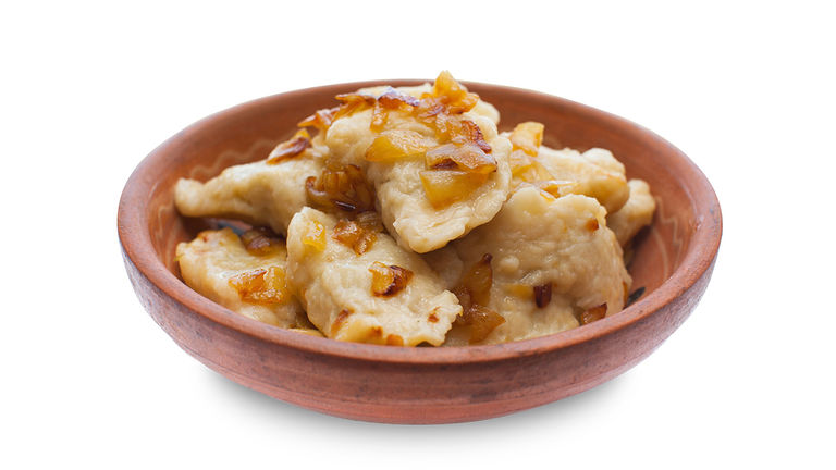 Pierogi, pan-fried or boiled dumplings stuffed with a variety of meat or vegetables, is a traditional Polish comfort food.