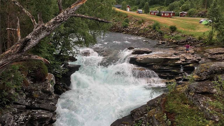 One of the first stops on the tour is Gudbrandsjuvet, a deep ravine through which the Valldola River flows.