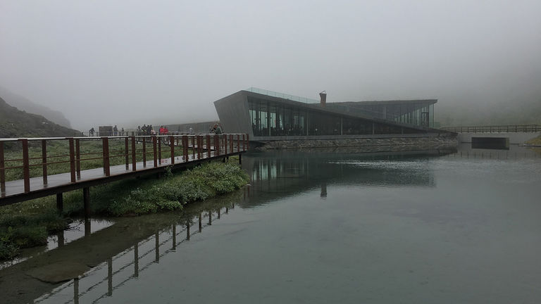 The main Trollstigen visitors center, constructed mainly of concrete, steel and glass, was designed to blend into the surroundings; inside, clients can try “troll ice” for dessert.