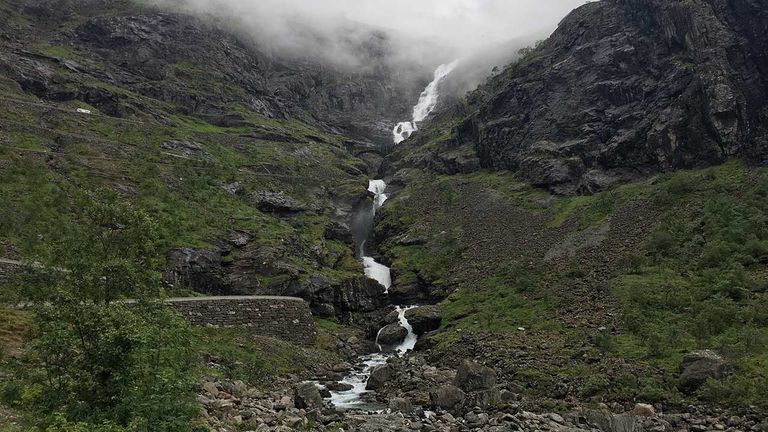 Each harrowing turn of the Trollstigen road affords views of the Stigfossen waterfall.