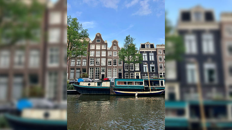 Amsterdam’s canals are lined with historic, sculptural homes.
