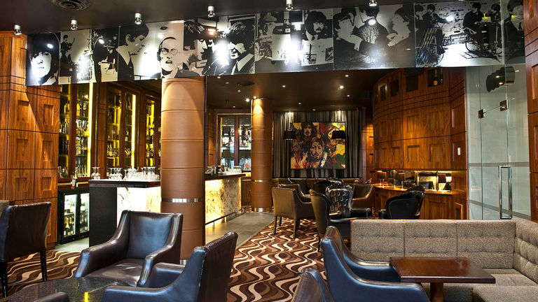 Guests can listen to live music at Bar Four.