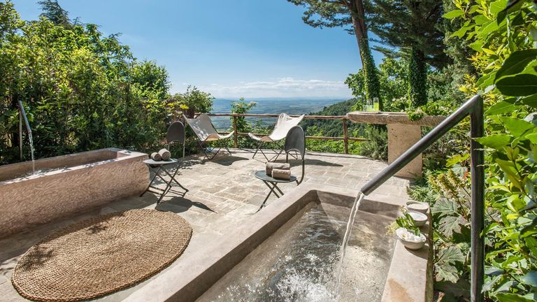 Couples can enjoy an outdoor bath following a massage at Monteverdi Tuscany.