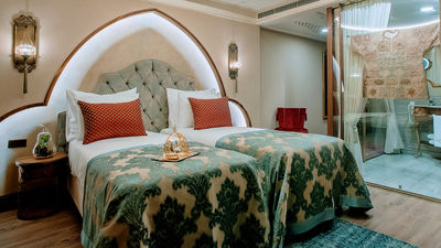 Guestrooms feature replicas of Ottoman Empire-era talismanic shirts.