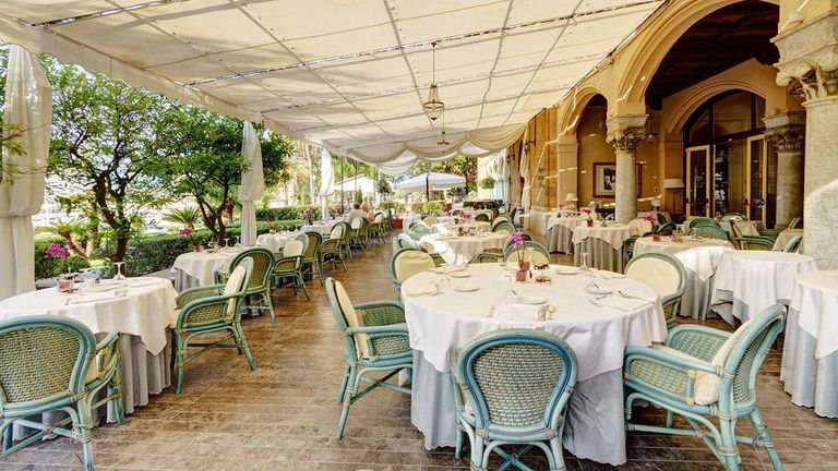 Donna Franca Florio, which serves Mediterranean specialties for lunch and dinner, has a terrace facing the sea.