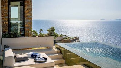 Villas at One&Only Kea Island feature private infinity pools and a sunken lounge area.