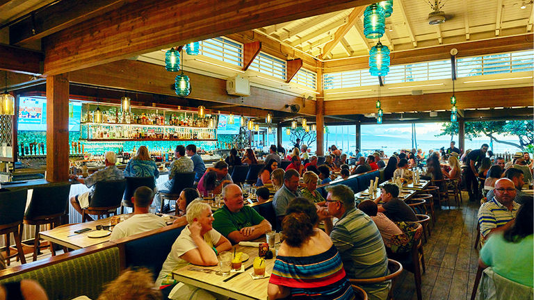 Monkeypod Kitchen satisfies clients with its lively, ocean-view design and farm-to-table fare.