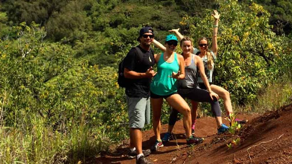 Kahokulea Haiku (left) leads a small group hike in Kamana Iki Valley. // © 2014 Hawaiian Hiking Company 2