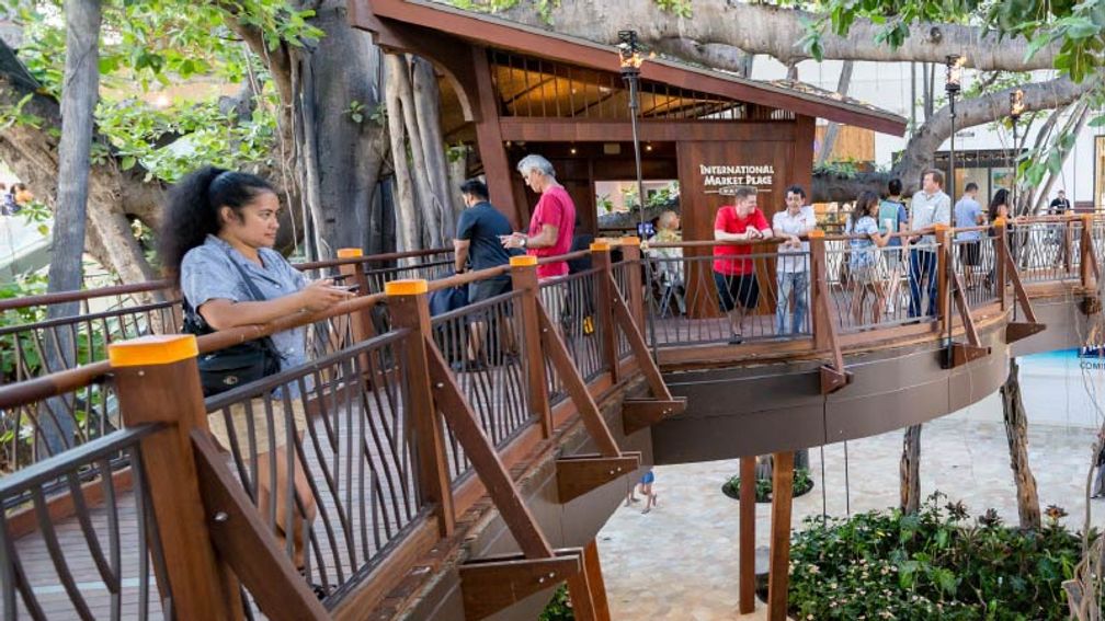 A 160-year-old banyan tree presides over the renovated International Market Place, notable for its open-air, culturally sensitive design. // © 2016 International Market Place 2