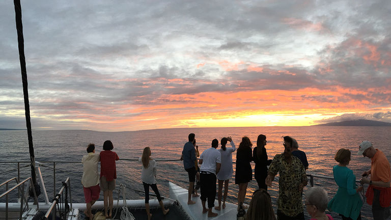 An ever-changing sunset sky creates a dreamy mood for clients on Alii Nui’s sunset sail.
