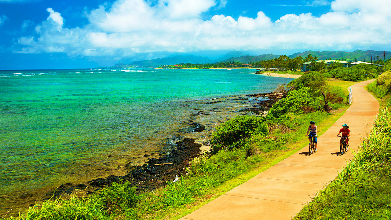 Coconut Coasters offers rental bikes for exploring Kauai’s eastern shoreline on a scenic multiuse path.