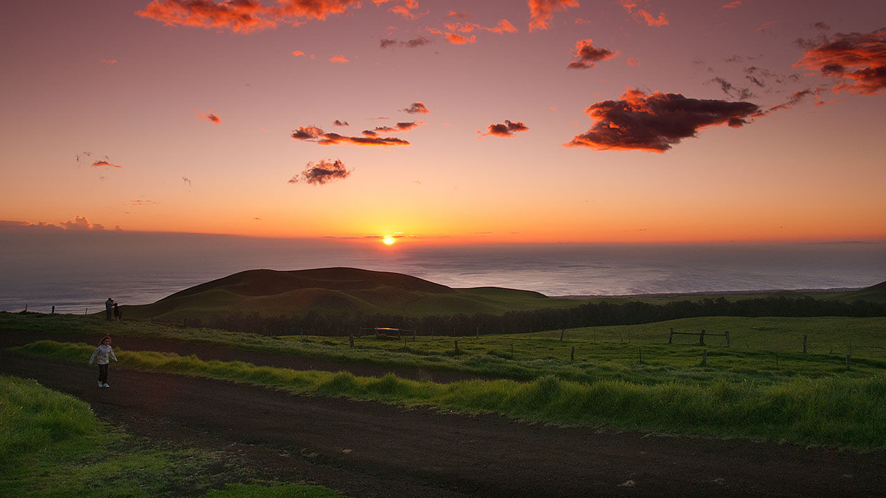 Sunsets from an elevation of 3,200 feet cast a magical glow on the Evening at Kahua Ranch.