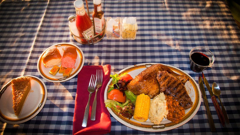 The evening includes an all-you-can-eat barbecue dinner and open bar with beer and wine.