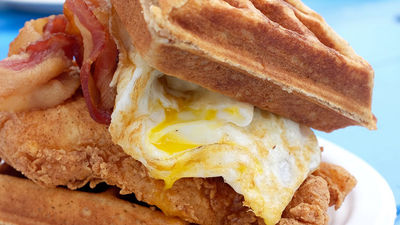 On Kauai, the chicken and waffles at Nom Breakfast & Burgers has earned a devoted following. // © 2016 Peter Burka