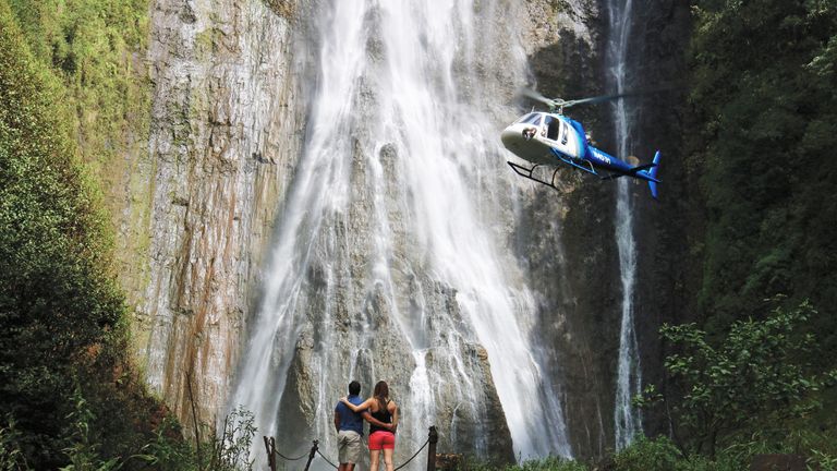 Landing at 400-foot Manawaiopuna Falls is part of a tour exclusively offered by Island Helicopters Kauai.