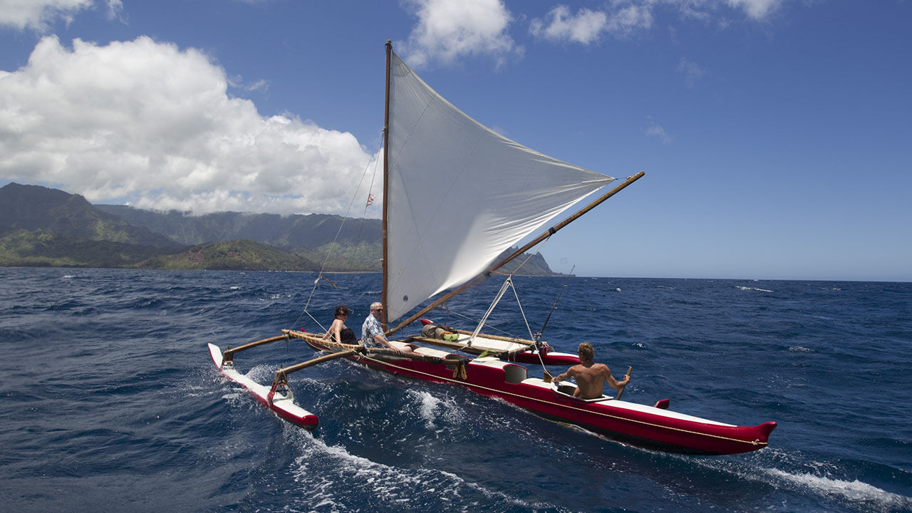 Island Sails Kauai treats passengers to the beauties of cliff-lined Hanalei Bay.