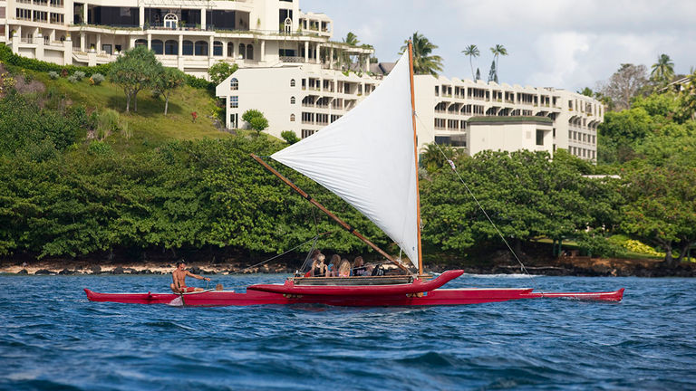 Each Island Sails Kauai tour starts and ends at the beach fronting St. Regis Princeville Resort.