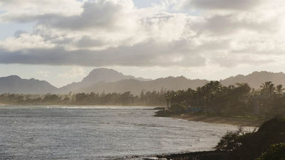 A coastal bike path is one of many attractions in Kapaa, Kauai. © // 2014 HTA/Tor Johnson F
