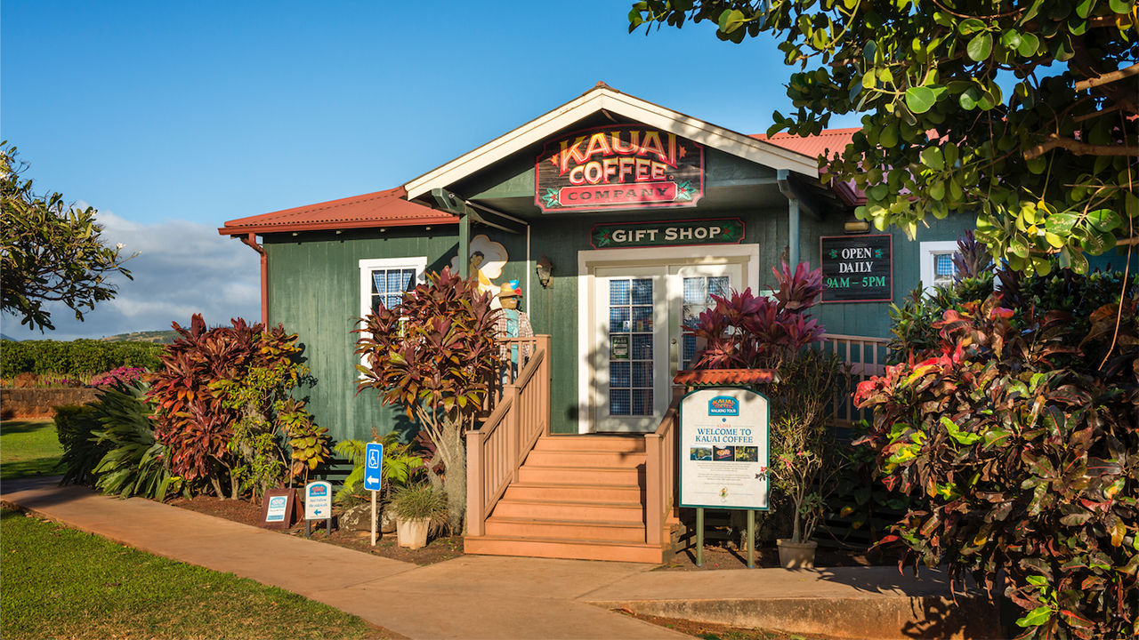 To create its visitors center, Kauai Coffee relocated and restored two camp houses from the estate's 19th-century sugar plantation days.