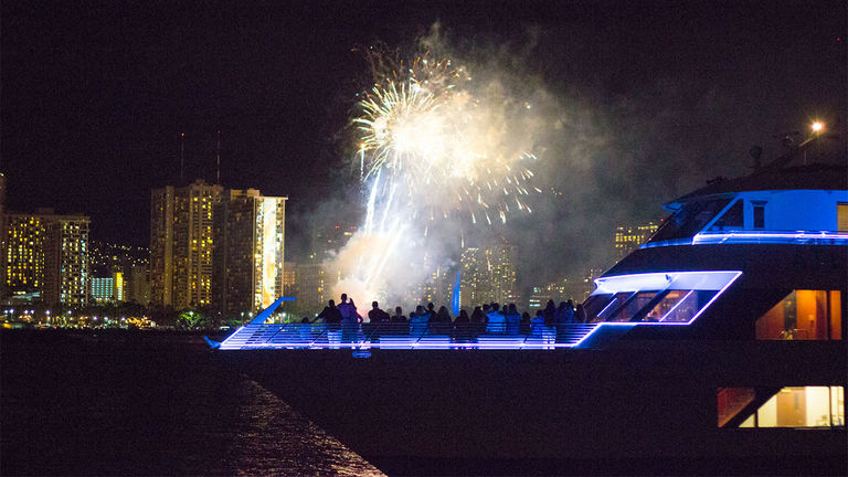 Passengers on Atlantis Adventures’ New Year’s Eve cruise are treated to stellar views of the pyrotechnics over Waikiki.