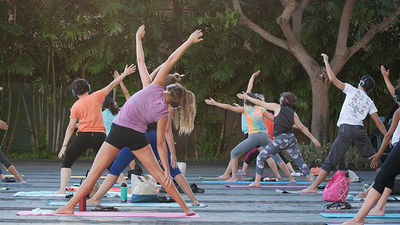 Free yoga classes are among the ongoing events offered at Ward Village, a mover and shaker in the Kakaako neighborhood. // © 2016 Ward Village