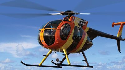 Travelers can catch a helicopter ride on a recreation of the Chopper from “Magnum, P.I.” out of Turtle Bay Resort. // © 2013 Turtle Bay Resort F