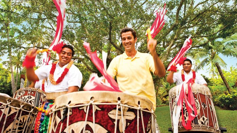 Polynesian Cultural Center immerses clients in Pacific Island traditions through activities such as Tongan drumming.