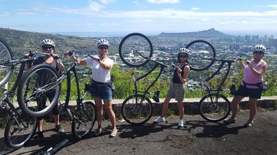 Stops during the Downhill Bike Adventure invite clients to savor the views and pose for memory-making photos.
