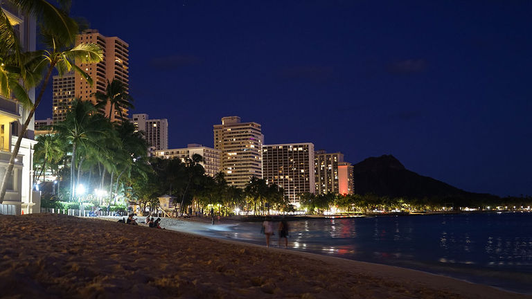 Crowds are few and far between on Waikiki Beach and the surrounding area.