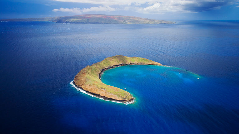 A five-hour snorkeling adventure to Molokini Crater is among Trilogy's offerings.