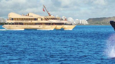 The Navatek heads east past Diamond Head, providing passengers with plenty of whale-watching opportunities. // © 2014 Atlantis Adventures
